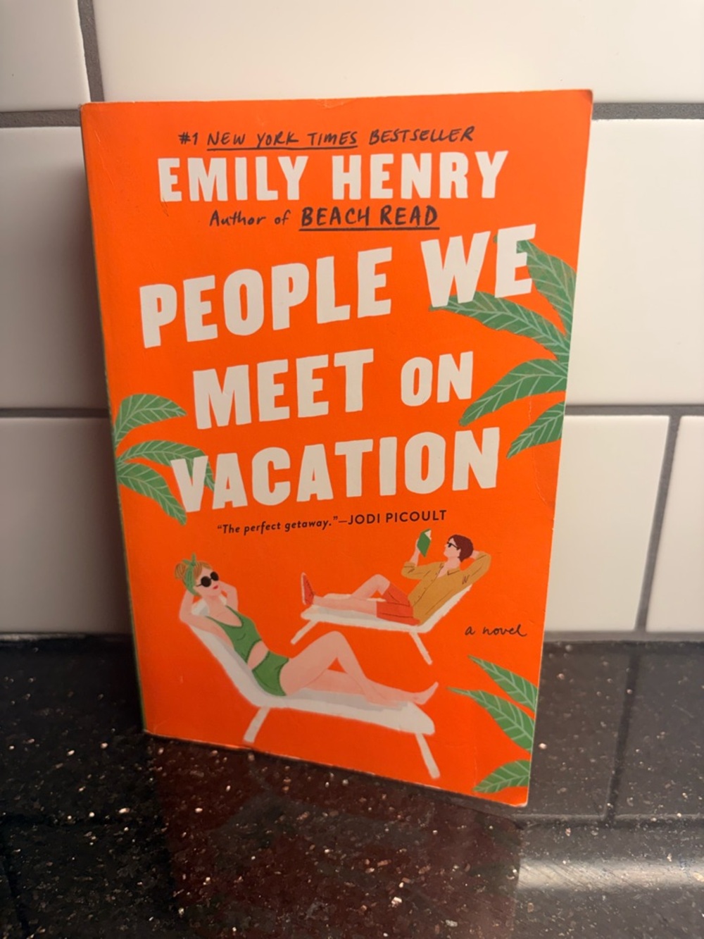Emily Henry "People We Meet on Vacation" — Bright Orange Paperback